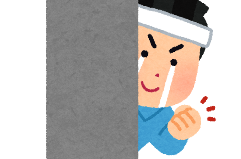 影応援の中年男性