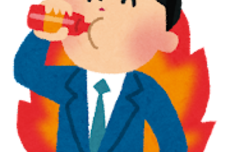 栄養ドリンクを飲む男性
