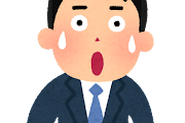 驚き顔の男性社員